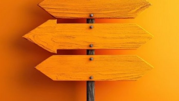 a decorative element: large, orange, wooden signposts