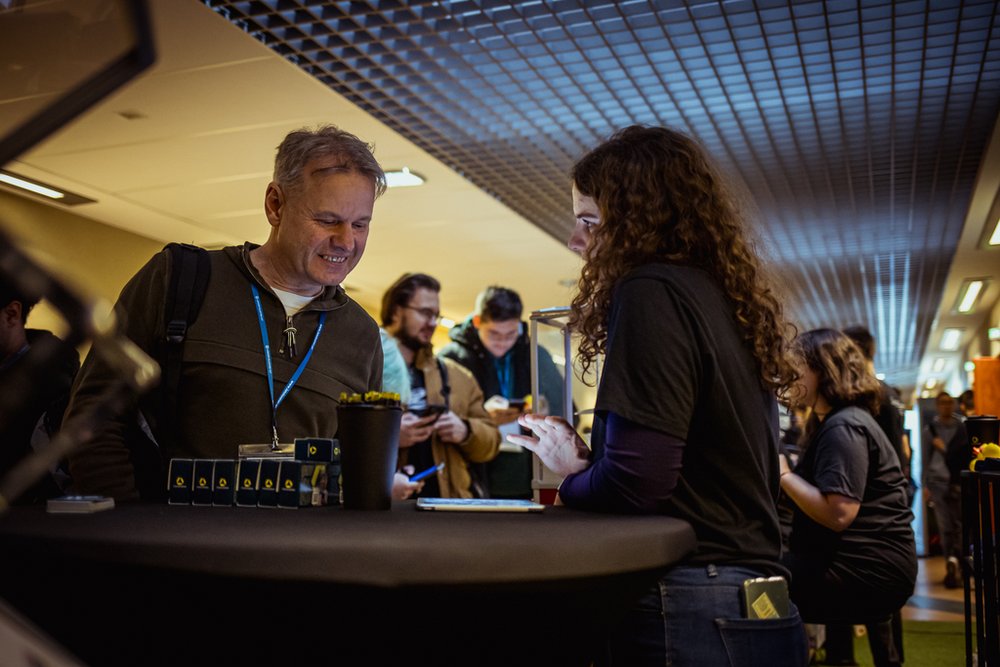 participants of the event visiting exhibitors' stands