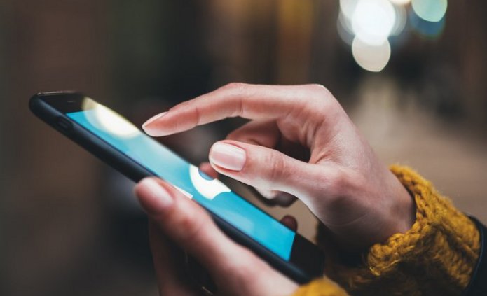 a decorative element: an individual using a phone