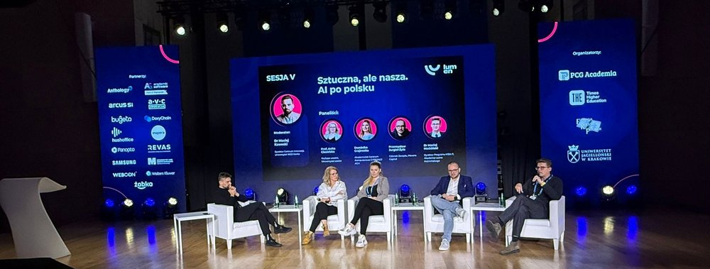 A photo of people participating in the panel