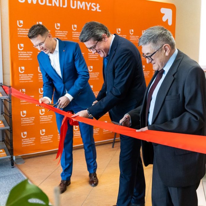 The red ribbon cutting opening the relaxation zone, from the right: Paweł Maślanka, Tomasz Wolanowski, Adam Wieczorek