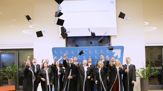 The 26th edition of the MBA studies group during the ceremony of throwing out the graduation caps