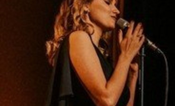 Vocalist Joanna Aleksandrowicz on stage