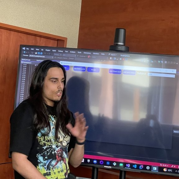 students presenting their app