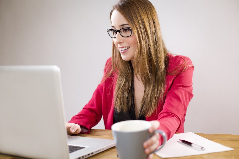A woman working at a computer