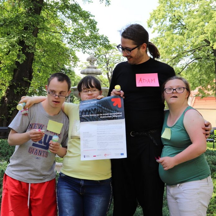 A photo of Dr Adam Drozdowski with the project participants