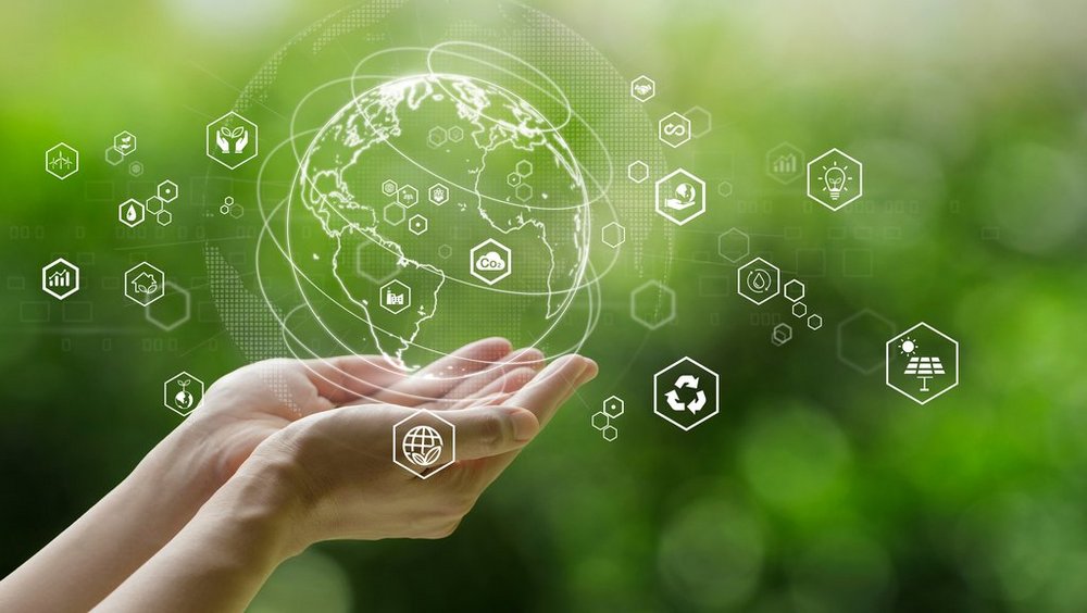 grafika pokazuje symbol planety Ziemia na zielonym tle 