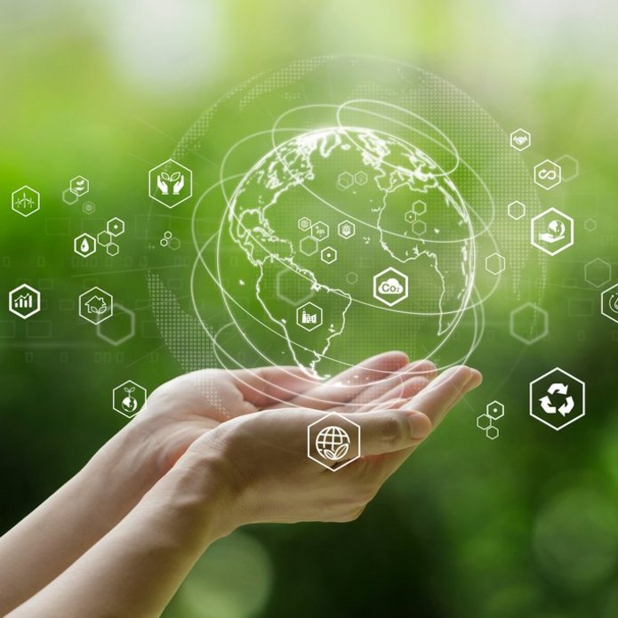 grafika pokazuje symbol planety Ziemia na zielonym tle 