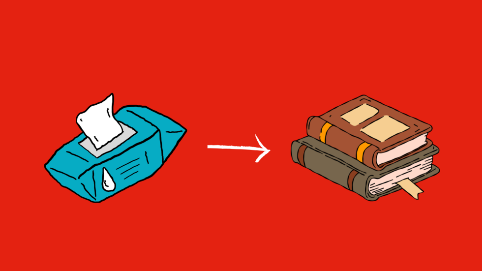 paczka chusteczek nawilżanych oraz dwie książki na czerwonym tle.