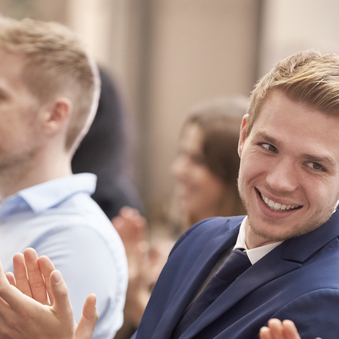 Young people applauding