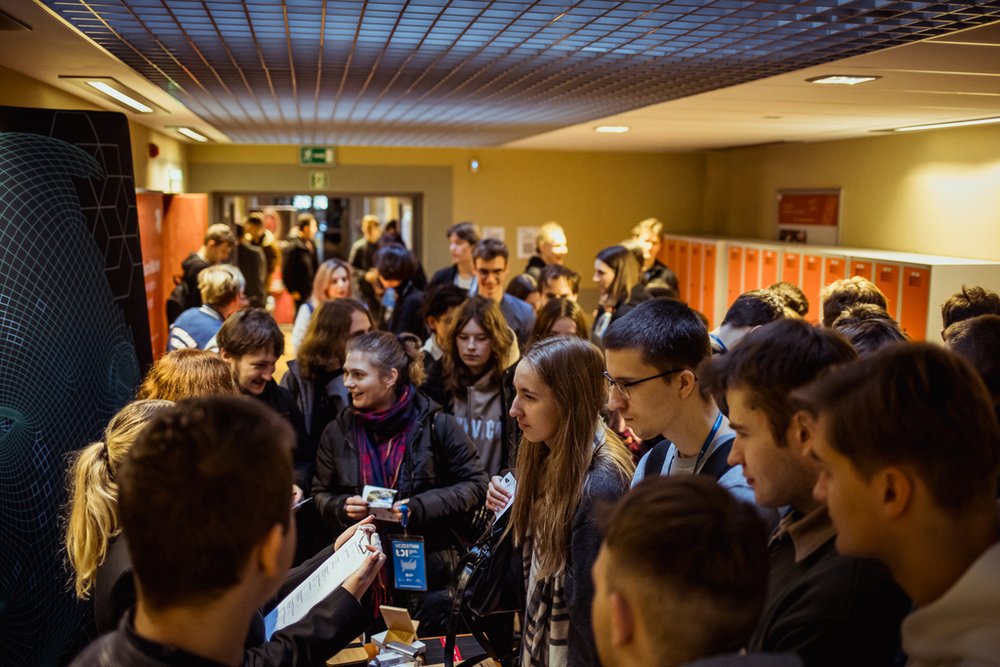 participants of the event visiting exhibitors' stands