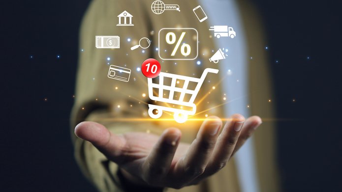  visualisation of shopping symbols, including a shopping cart and a percentage sign, on a hand