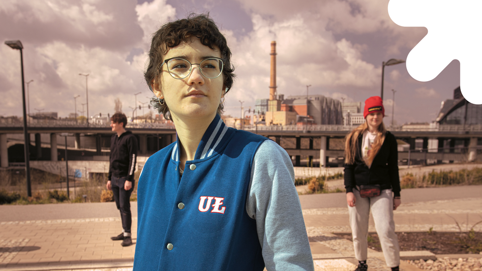 Students against the background of the city of Łódź