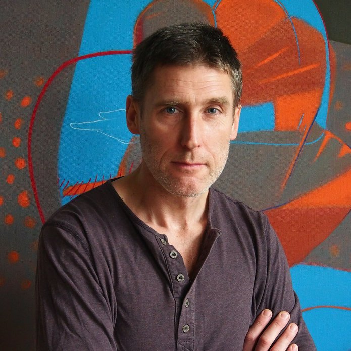 portret Jacka Świgulskiego, mężczyzna po 40 roku życia patrzy w bok