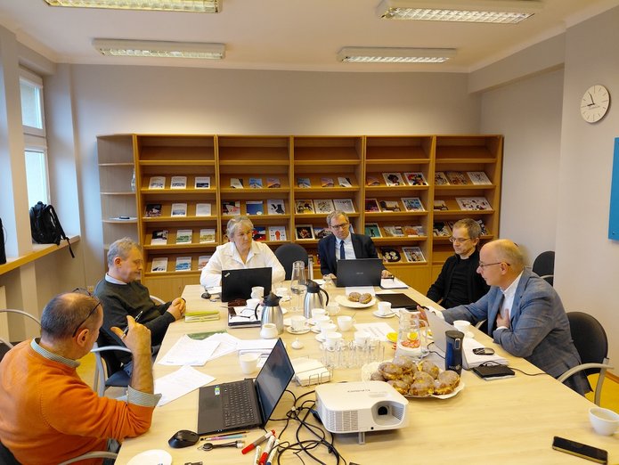 A group of scientists working at a table