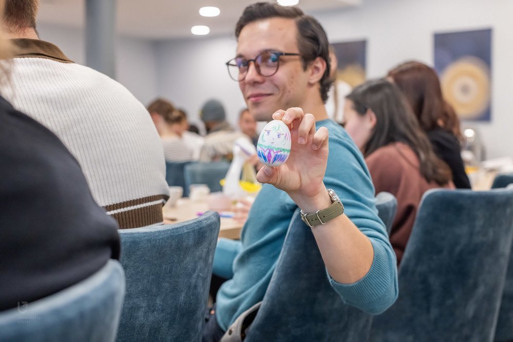 Student with a handmade Easter egg