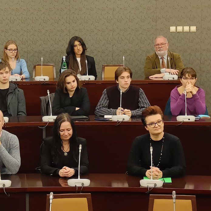 Participants and mentors of the "Talented at School, Brilliant at the University" programme sitting at the assembly hall during the inauguration