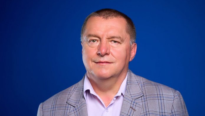 a portrait photo of Dr Bogdan Lach