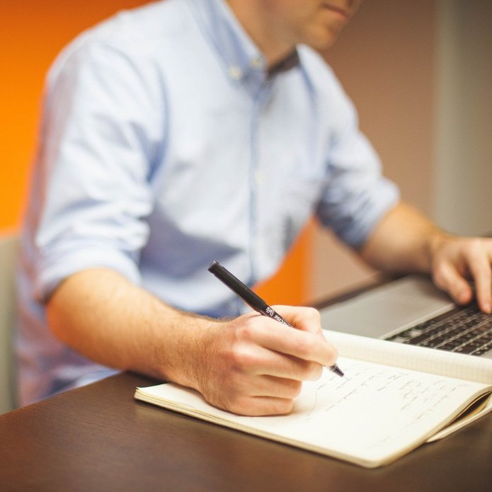 Freehand writing on a piece of paper