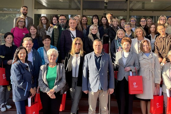  a group of students with diplomas