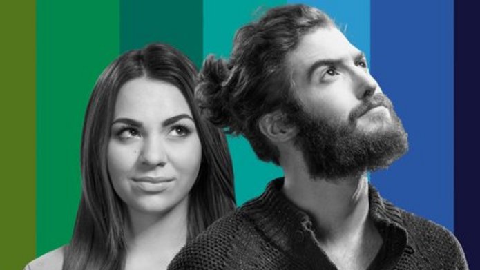 Students - a girl and a boy against the background of colourful stripes