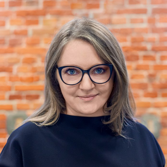 a portrait photo of Dr Małgorzata Grodzicka-Kowalczyk 