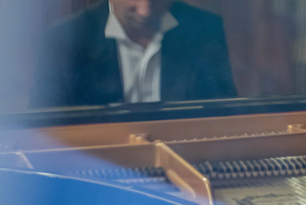 A man sitting at the piano