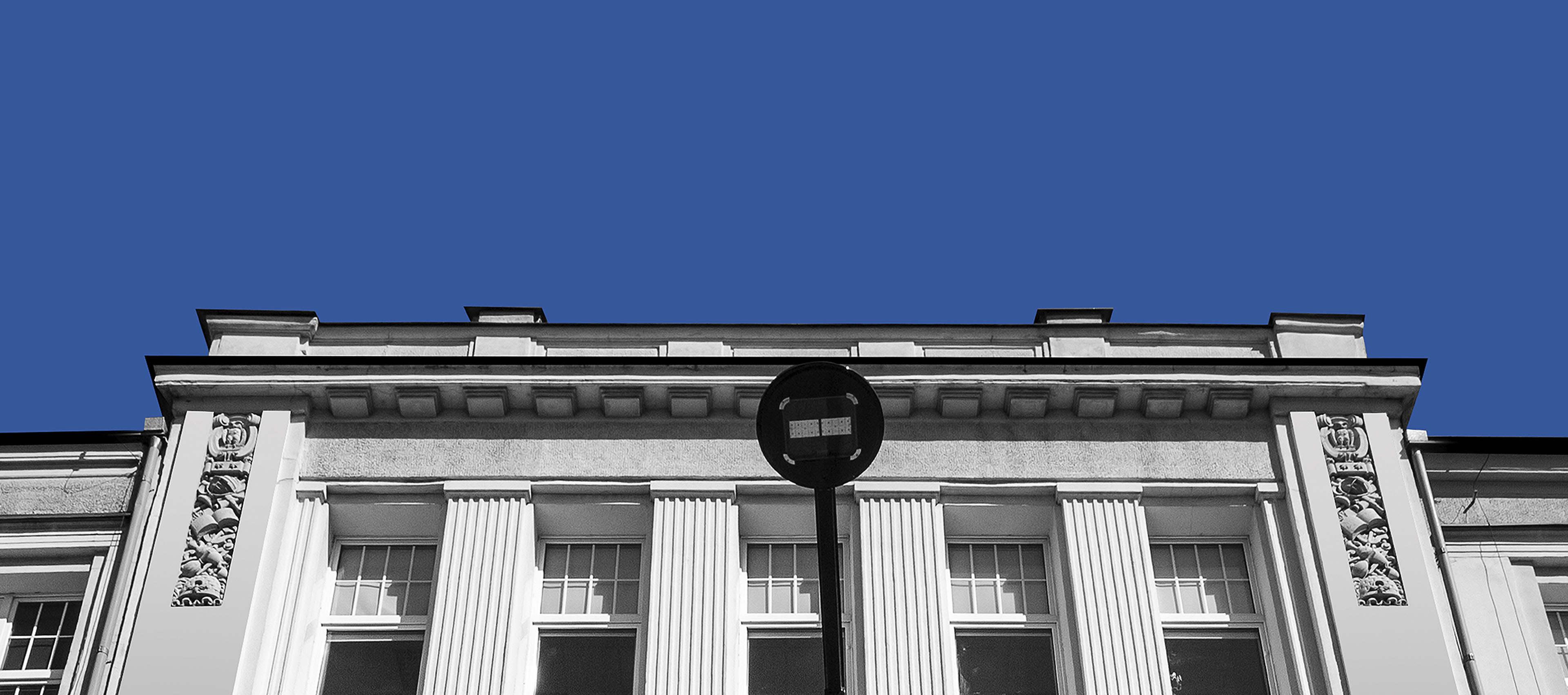 a graphic with the faculty building