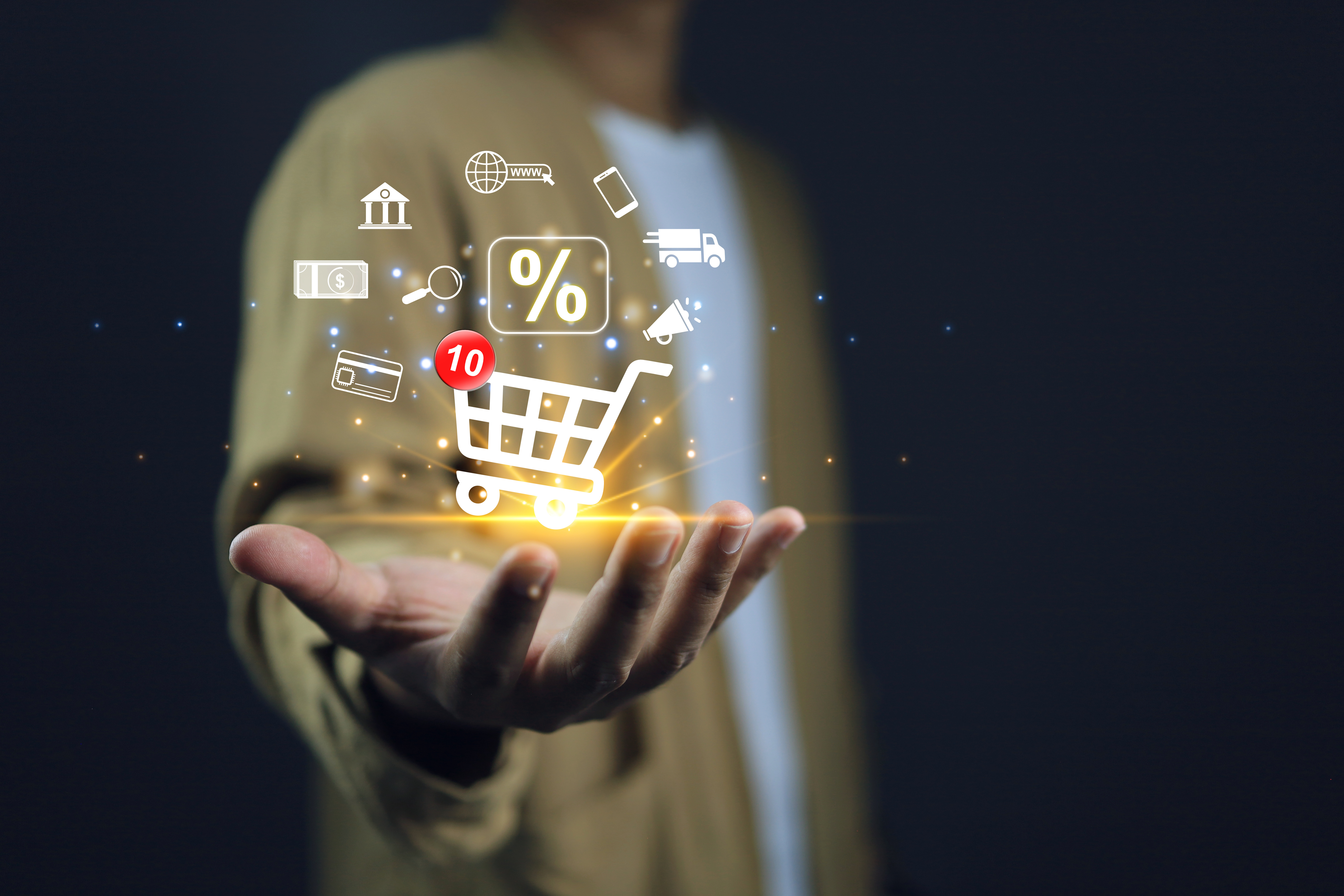 wizualizacja symboli zakupowych na dłoni, w tym koszyk zakupowy, znak procentowy