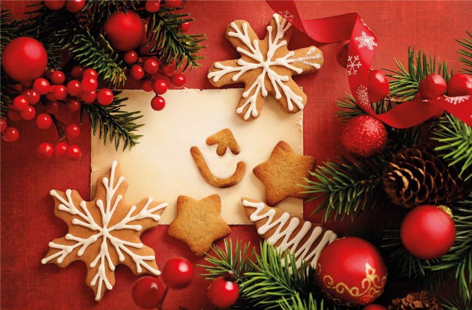 Karta świąteczna z czerwonymi bombkami i ciasteczkami w kształcie gwiazdek i logo UŁ